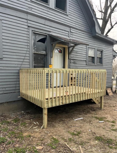 Property entrance with a deck