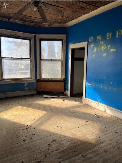 Empty room featuring wooden ceiling