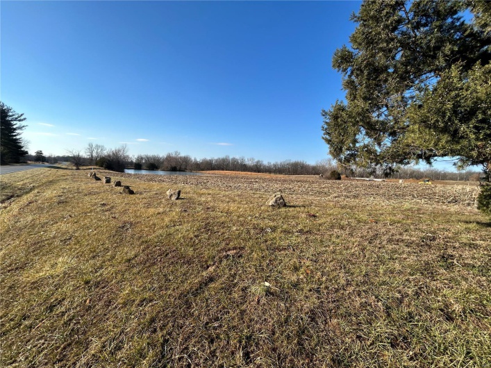 View of yard with a rural view
