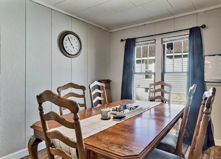 Dining area featuring hardwood / wood-style flooring