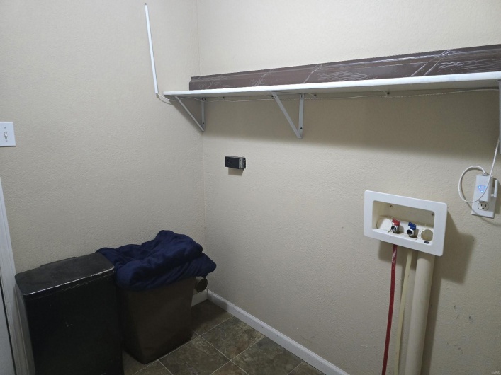 Laundry room with washer hookup