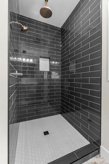Bathroom with a tile shower