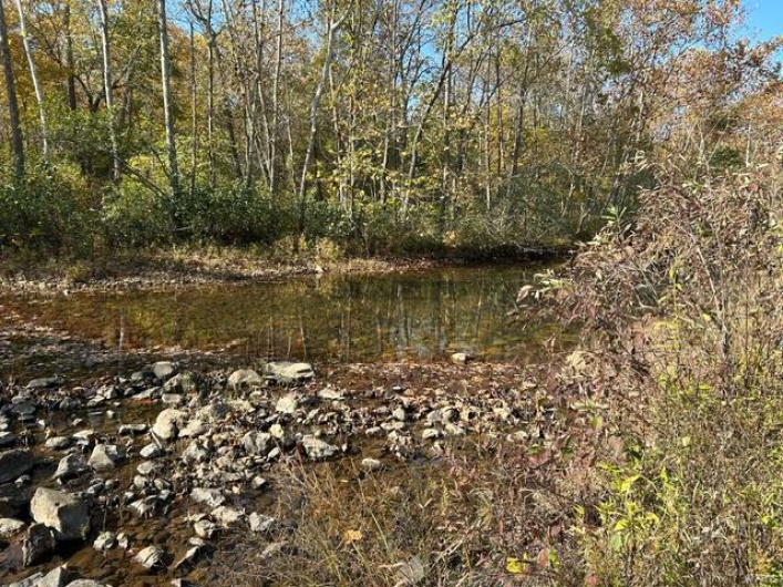 View of landscape with a water view