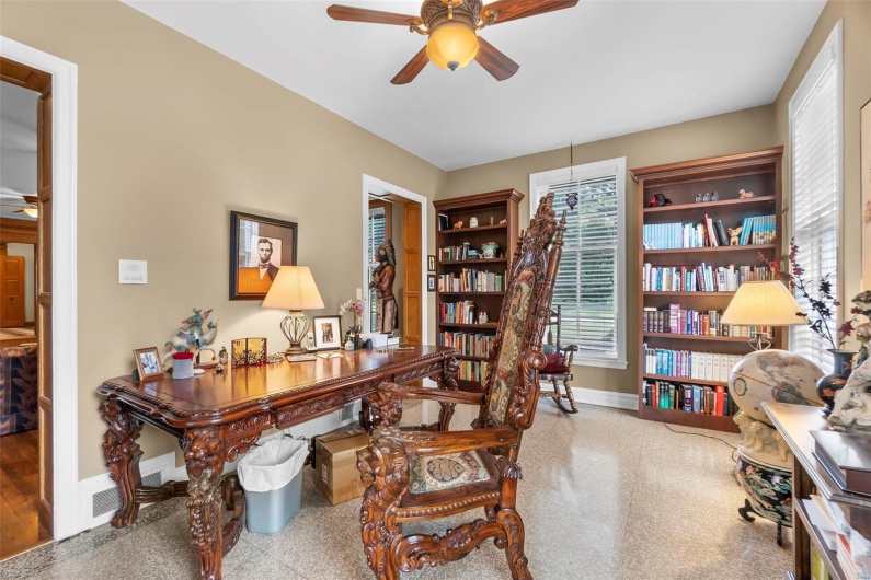 Office area featuring ceiling fan