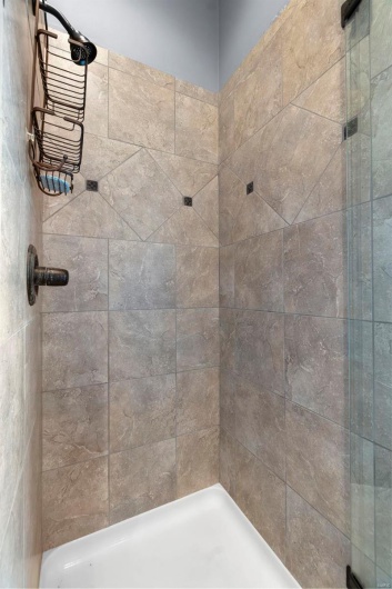 Bathroom with a tile shower