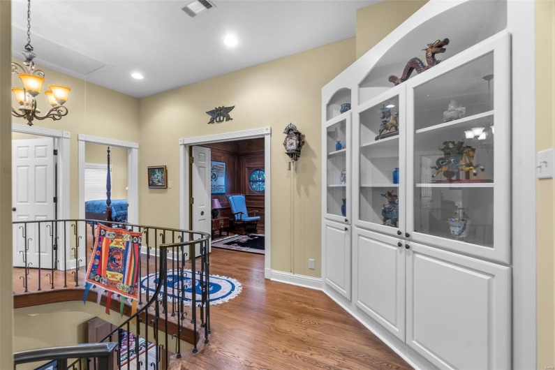 Corridor featuring dark hardwood / wood-style floors