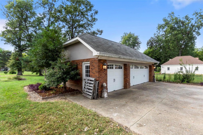 Garage with a lawn