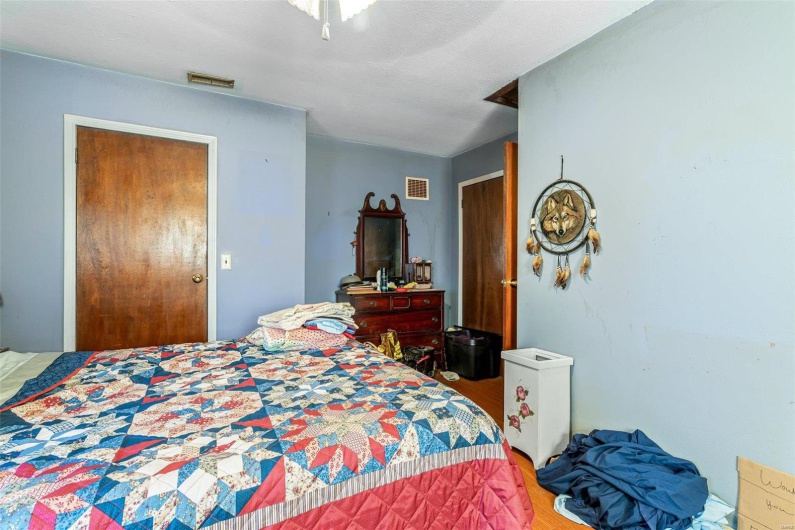 Bedroom featuring hardwood / wood-style flooring
