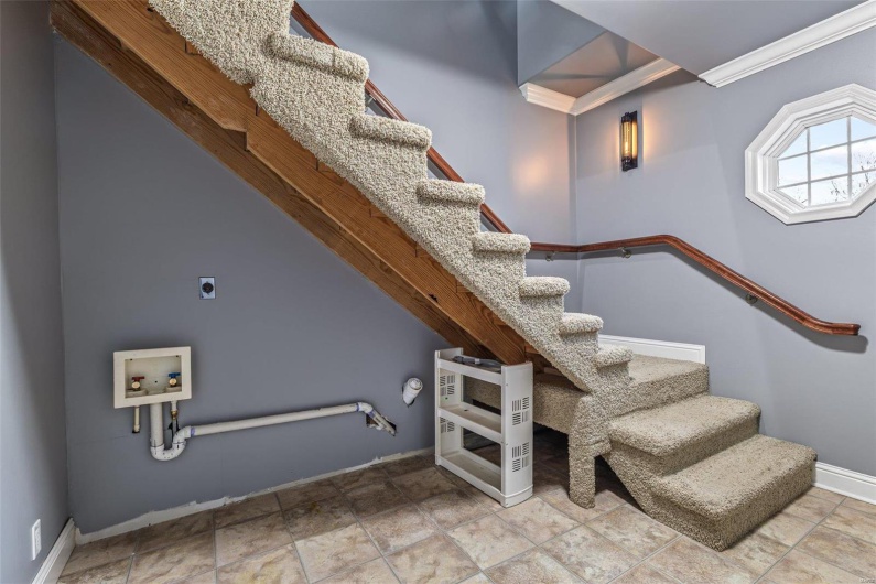 Stairs to 3rd floor primary suite. Laundry hook ups