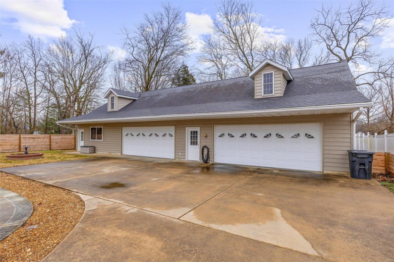 View of home's exterior featuring a garage