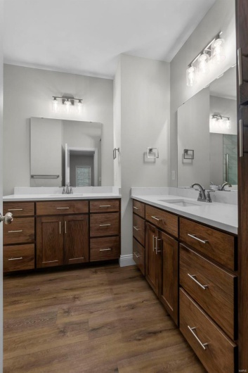 Bathroom with vanity and hardwood / wood-style floors
