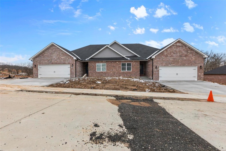 View of front of house with a garage