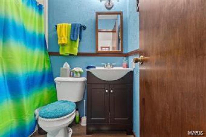 Bathroom with vanity and toilet
