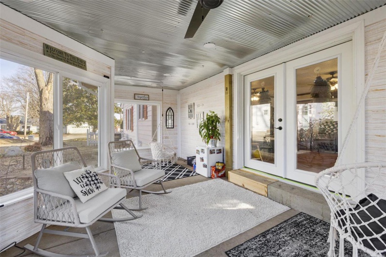 Sunroom with french doors and ceiling fan