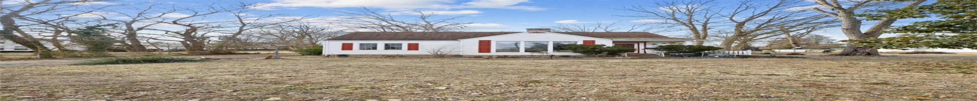 Residential For Sale View of front facade with a front lawn