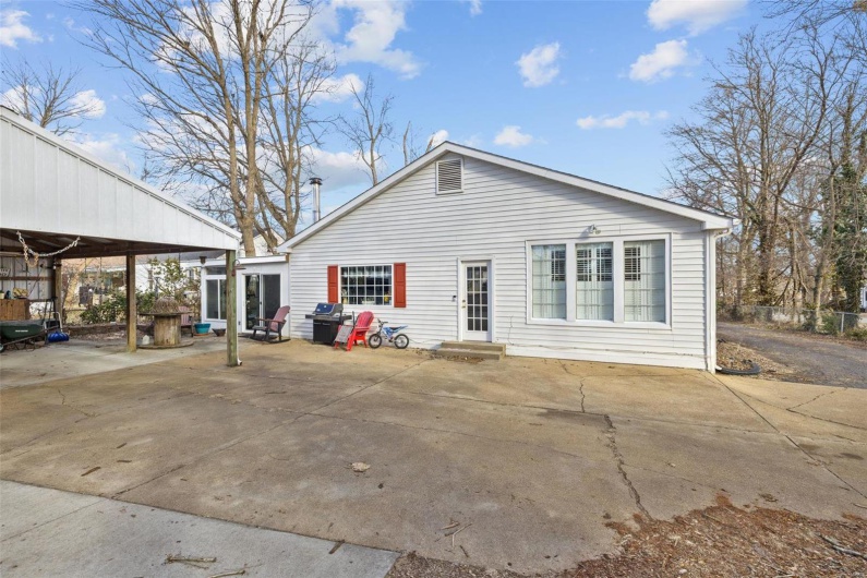 Rear view of house with a patio