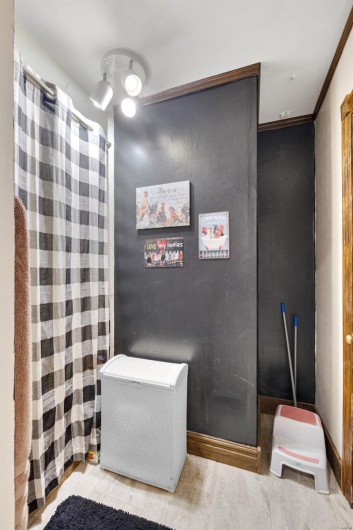 Bathroom featuring crown molding