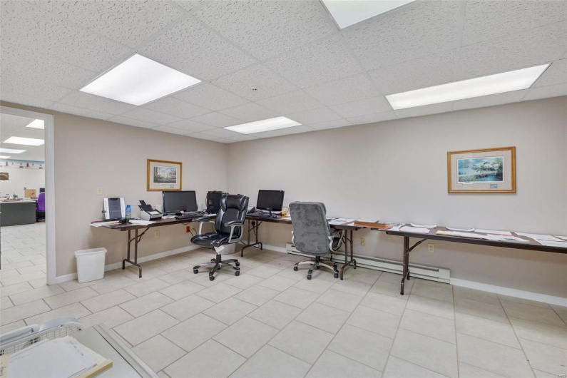 Tiled office with a paneled ceiling