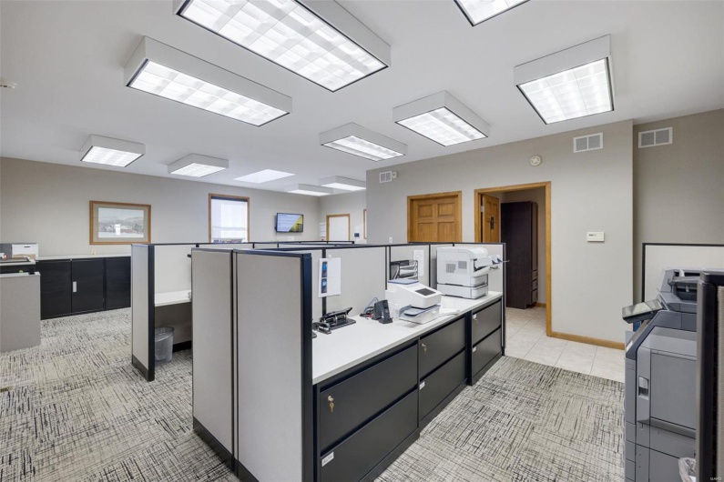 Kitchen with range and light tile patterned floors