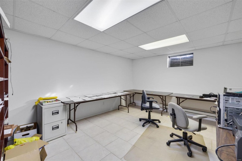 Office featuring a paneled ceiling