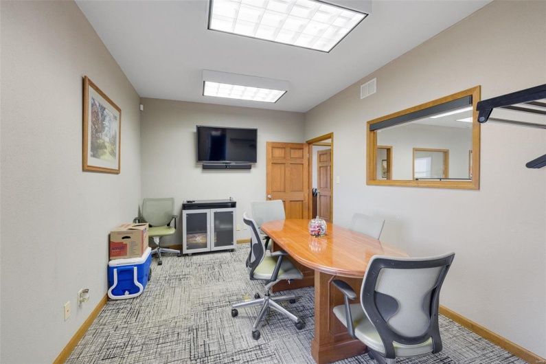 Home office featuring carpet flooring