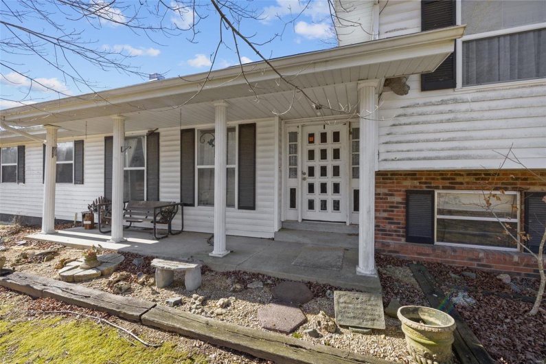 Property entrance featuring a porch