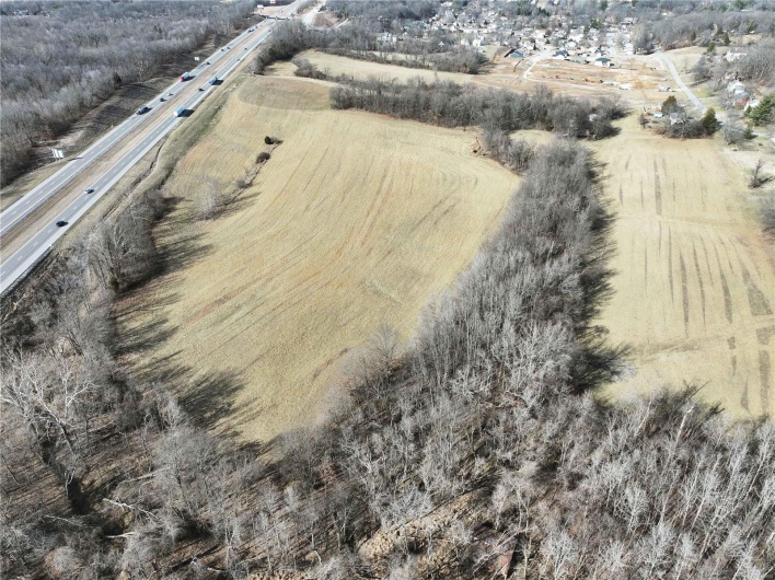 Birds eye view of property with a rural view