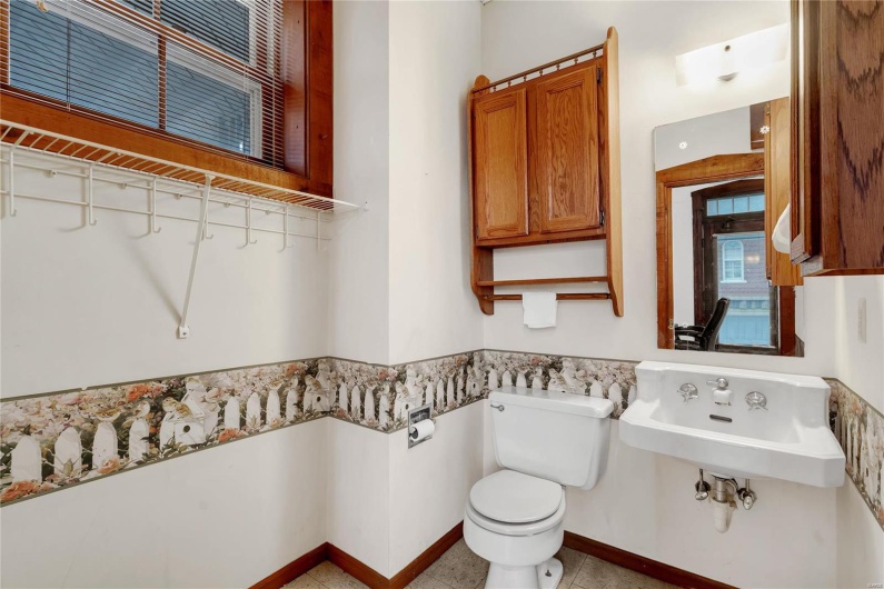 Bathroom featuring sink and toilet