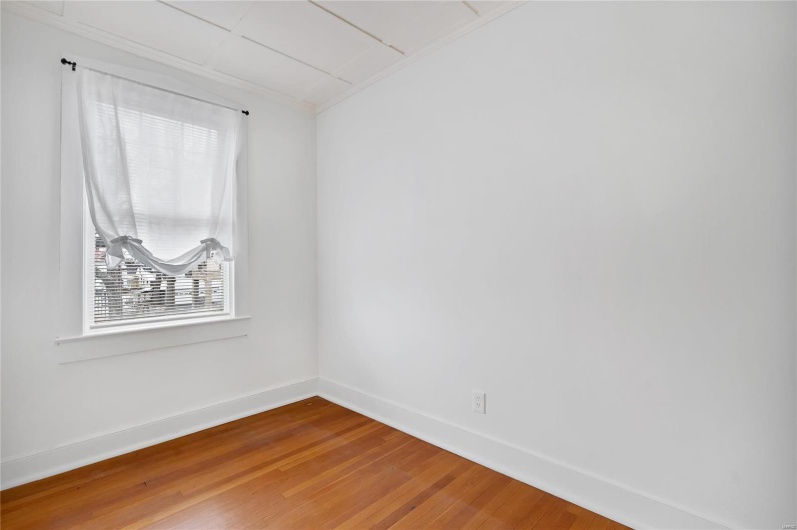 Second floor apartment. Spare room with hardwood / wood-style floors