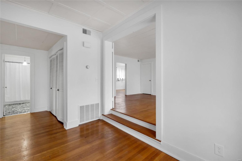 Second floor apartment. Corridor featuring hardwood / wood-style flooring