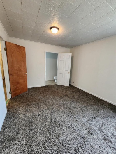 bedroom featuring carpet flooring