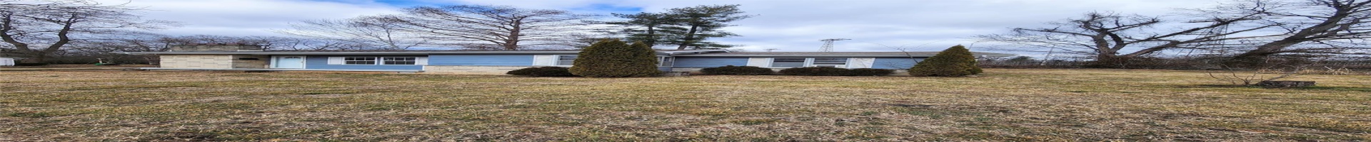 Residential For Sale View of front of house with a front lawn