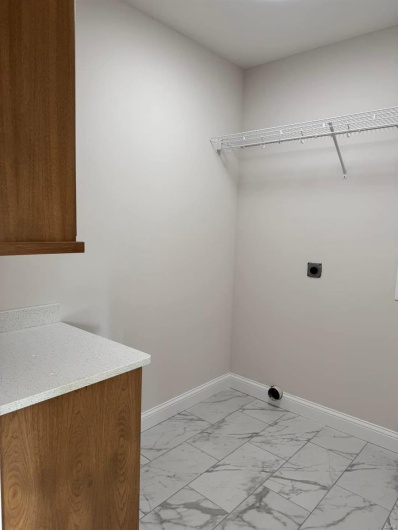 Washroom with electric dryer hookup