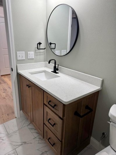 Bathroom with vanity and toilet