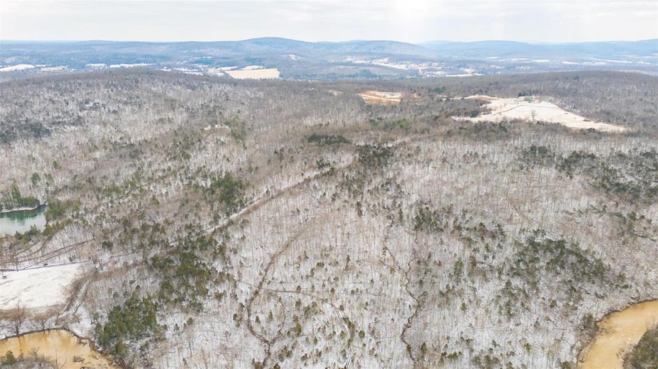 Drone / aerial view featuring a mountain view