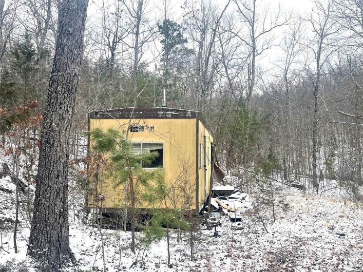 old mobile home, once used as a hunting camp