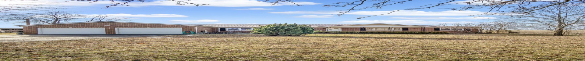 Residential For Sale Ranch-style home with a garage, a front yard, brick siding, and driveway