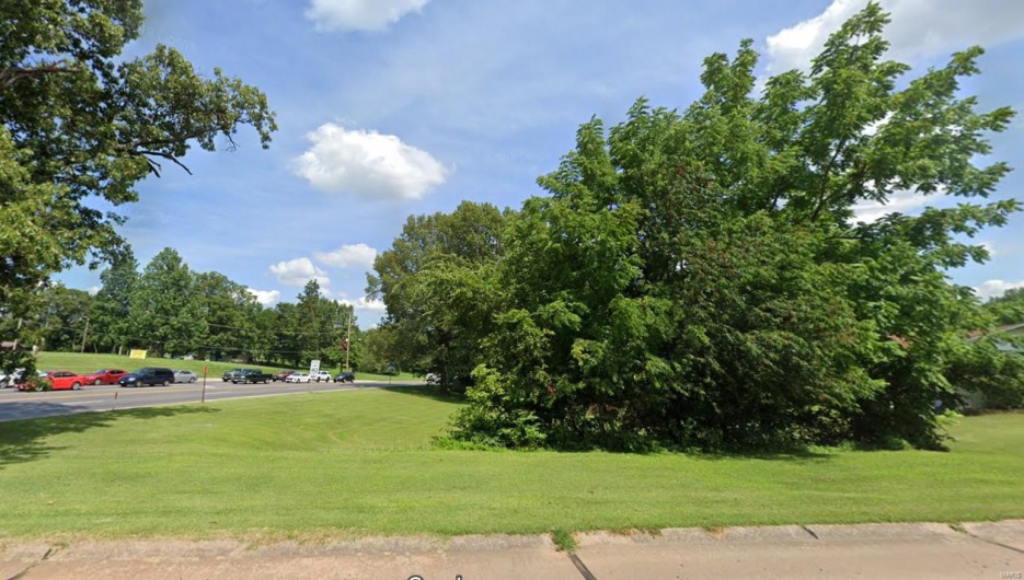 View of community featuring a lawn