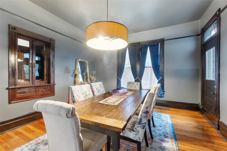Dining area with hardwood floors