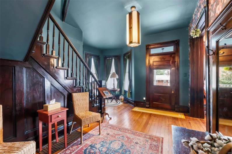 Foyer entrance with hardwood floors