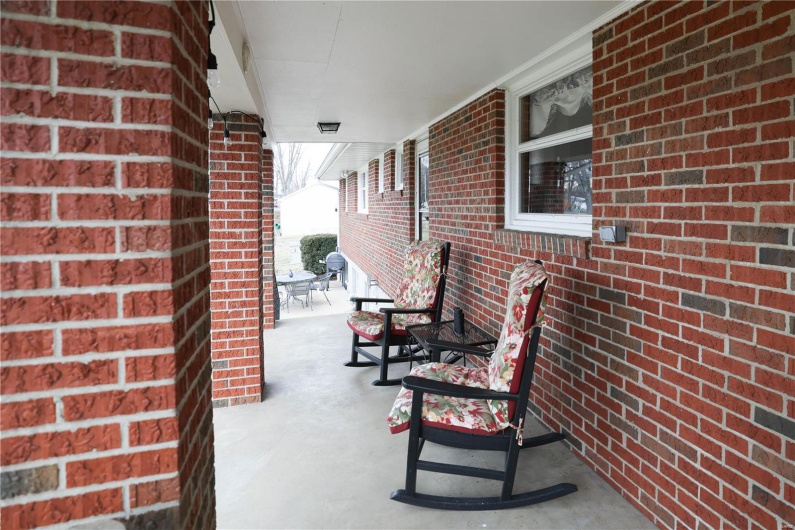 View of patio with a porch