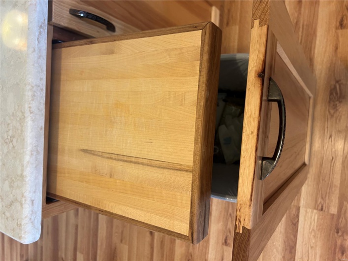 Room details featuring light brown cabinetry