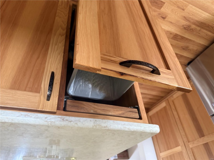 Interior details featuring light wood-style flooring