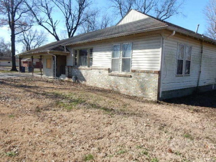 View of home's exterior with brick siding