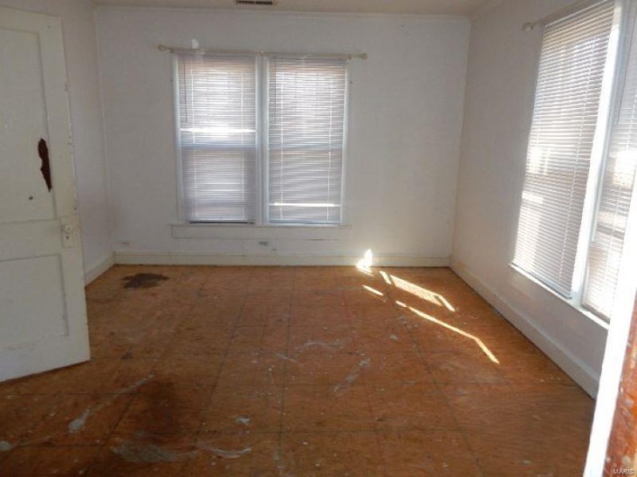 Empty room with baseboards