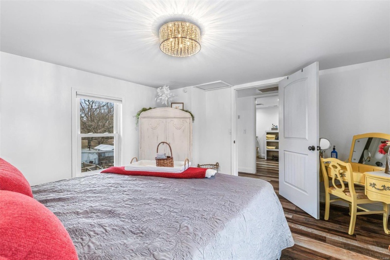 Bedroom with wood finished floors