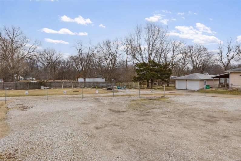 View of yard featuring fence