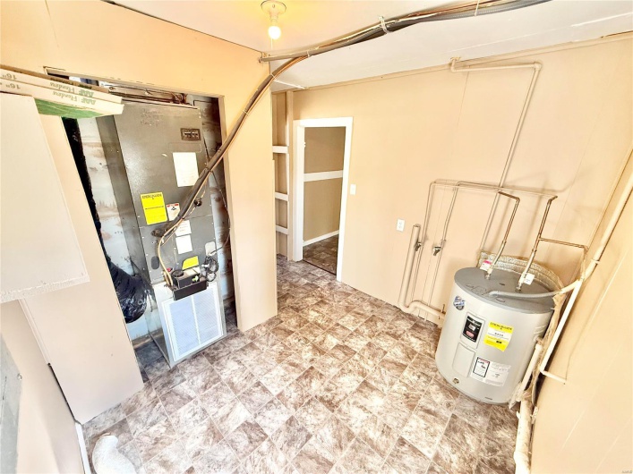 Utility room with water heater