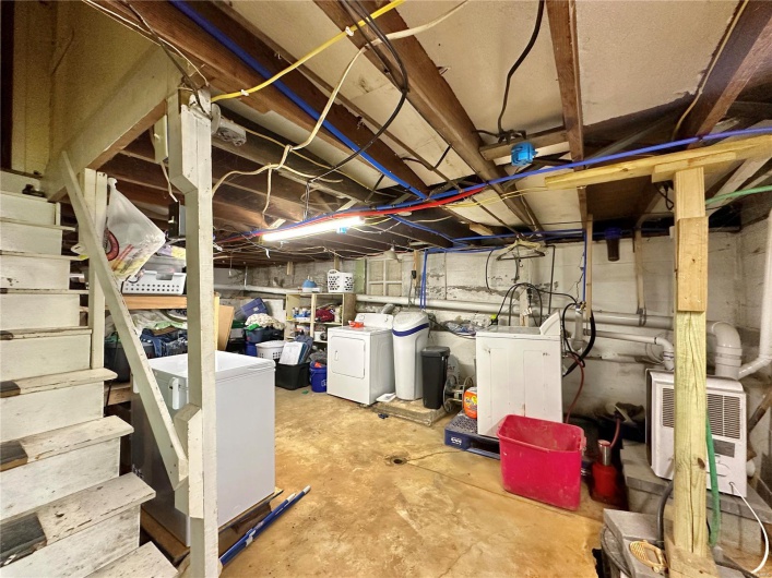 Basement featuring washer and dryer