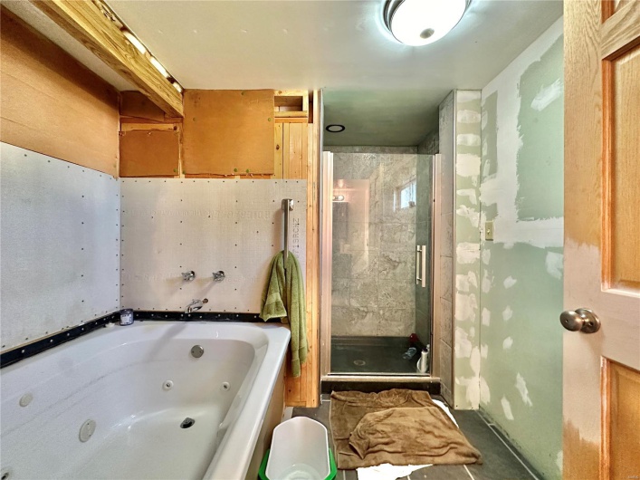 Bathroom with separate shower and tub